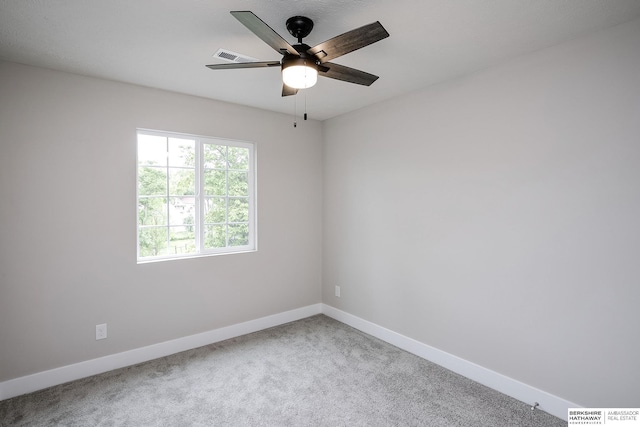 5445 S 51st St, Omaha, NE 68117 - carpeted spare room featuring baseboards and ceiling fan
