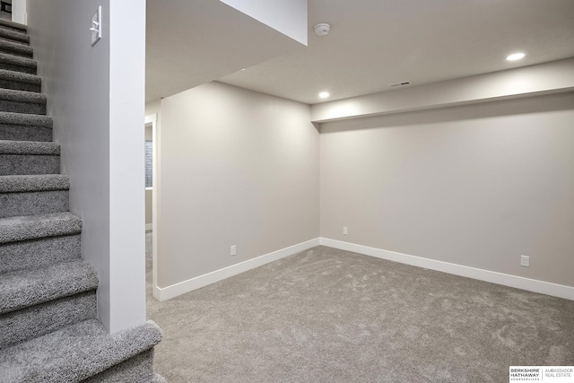 5445 S 51st St, Omaha, NE 68117 - finished below grade area with stairway, carpet, recessed lighting, and baseboards