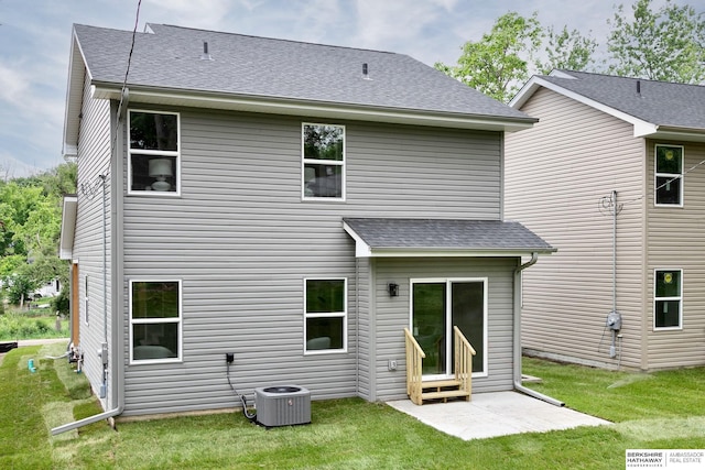5445 S 51st St, Omaha, NE 68117 - back of property featuring cooling unit, a lawn, and a shingled roof