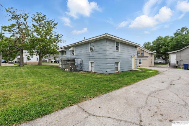 1136-1138 N D St, Fremont, NE 68025 - view of property exterior with a yard