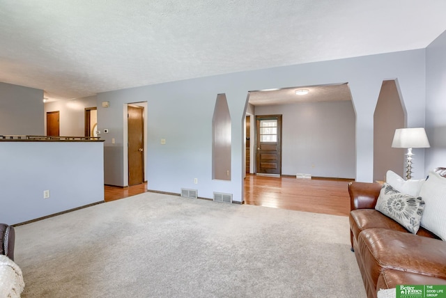 3209 Coffey Ave, Omaha, NE 68123 - living area with carpet floors and baseboards