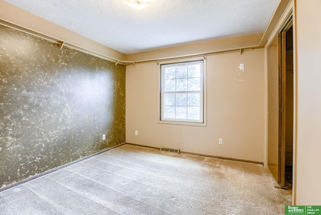 3209 Coffey Ave, Omaha, NE 68123 - unfurnished room featuring carpet flooring and baseboards