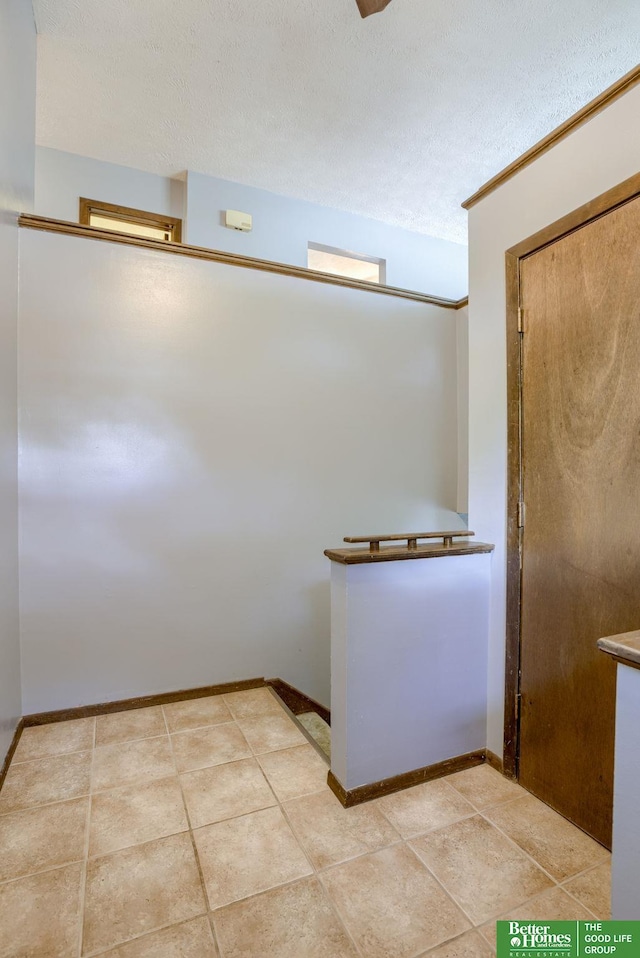 3209 Coffey Ave, Omaha, NE 68123 - bathroom featuring a textured ceiling