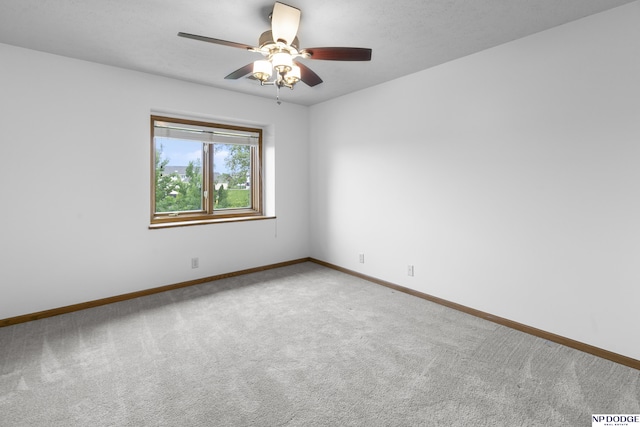 910 W Centennial Rd, Papillion, NE 68046 - carpeted spare room with a ceiling fan and baseboards