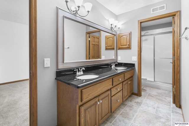 910 W Centennial Rd, Papillion, NE 68046 - bathroom with toilet, double vanity, and a stall shower