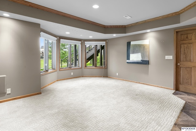 910 W Centennial Rd, Papillion, NE 68046 - spare room featuring crown molding, baseboards, recessed lighting, carpet, and a tray ceiling