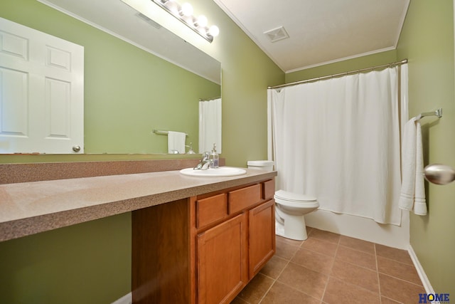 7348 N 19th St, Lincoln, NE 68521 - bathroom featuring vanity, toilet, ornamental molding, tile patterned floors, and baseboards