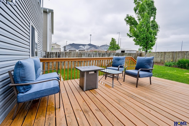 7348 N 19th St, Lincoln, NE 68521 - wooden terrace featuring a fenced backyard