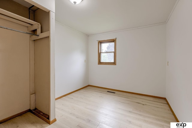 101 Station St, Shelby, IA 51570 - unfurnished bedroom with light wood-type flooring and baseboards