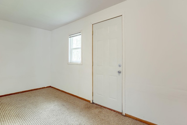101 Station St, Shelby, IA 51570 - unfurnished room featuring baseboards and light colored carpet