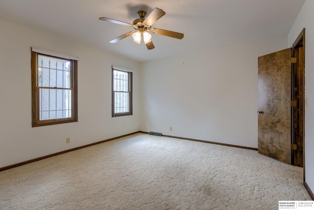 1905 S 116th St, Omaha, NE 68144 - carpeted spare room with ceiling fan and baseboards