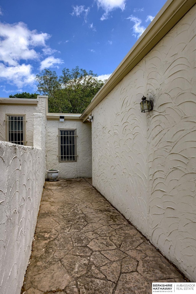 1905 S 116th St, Omaha, NE 68144 - view of property exterior featuring stucco siding