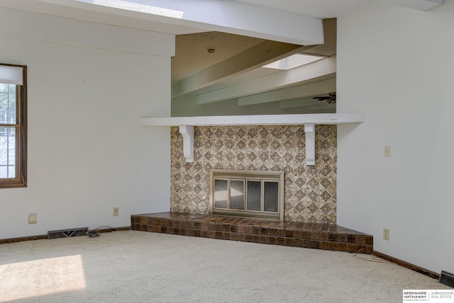 1905 S 116th St, Omaha, NE 68144 - unfurnished living room with a fireplace, carpet, baseboards, and beamed ceiling
