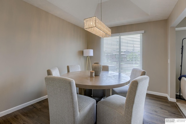 705 Ruby Rd, Papillion, NE 68133 - dining area featuring baseboards, a chandelier, and wood finished floors