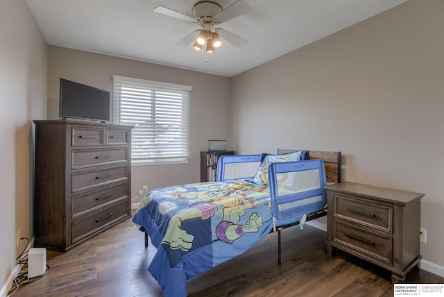 705 Ruby Rd, Papillion, NE 68133 - bedroom with wood finished floors, baseboards, and a ceiling fan