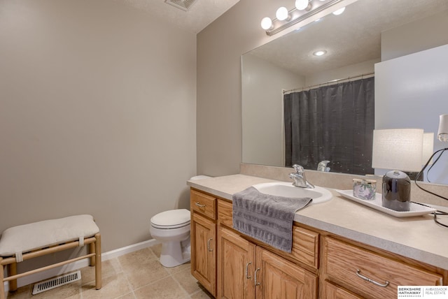 705 Ruby Rd, Papillion, NE 68133 - bathroom with vanity, toilet, and baseboards