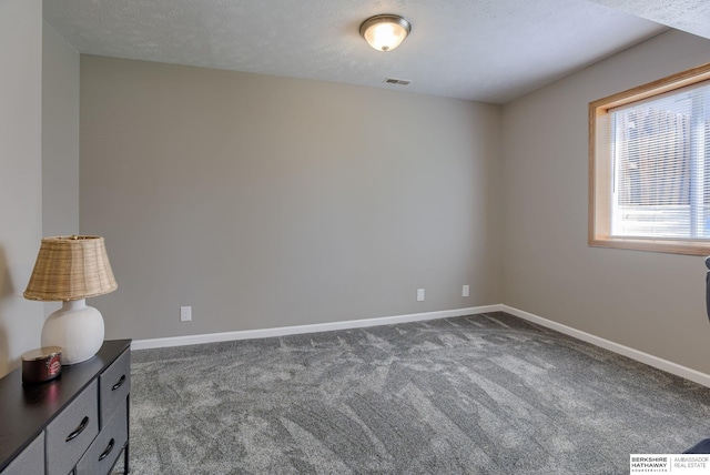 705 Ruby Rd, Papillion, NE 68133 - empty room featuring dark carpet and baseboards