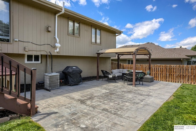 705 Ruby Rd, Papillion, NE 68133 - back of house featuring outdoor lounge area, a patio, central AC unit, and brick siding