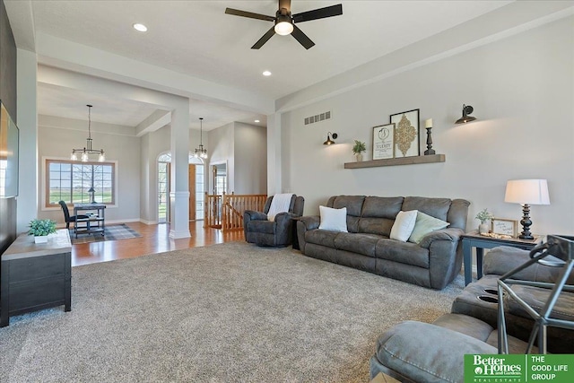 27896 Chestnut Rd, Treynor, IA 51575 - living room featuring ceiling fan, wood finished floors, recessed lighting, a chandelier, and baseboards