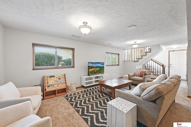 12231 Binney St, Omaha, NE 68164 - carpeted living area featuring stairway and a textured ceiling