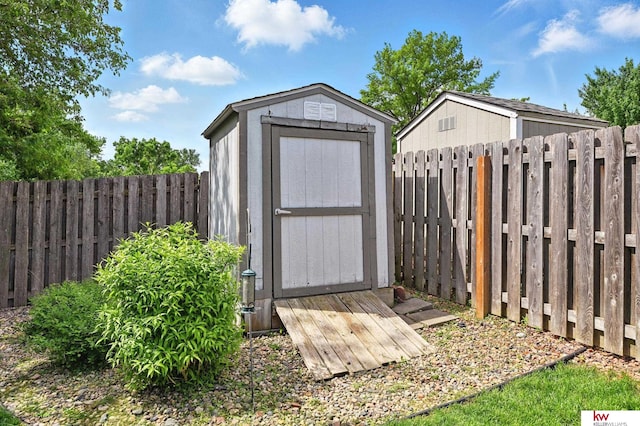 12231 Binney St, Omaha, NE 68164 - view of shed with a fenced backyard