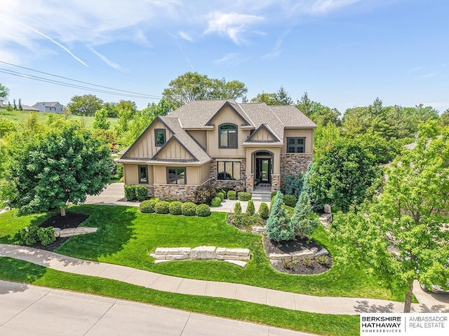 3334 S 188th Ave, Omaha, NE 68130 - craftsman house featuring stone siding, stucco siding, and a front lawn