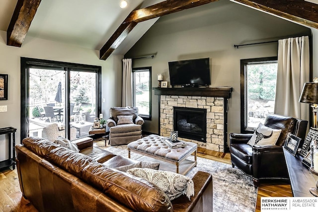 3334 S 188th Ave, Omaha, NE 68130 - living room featuring wood finished floors and a fireplace