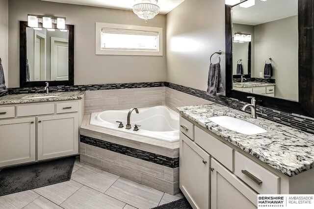 3334 S 188th Ave, Omaha, NE 68130 - full bathroom with a bath and two vanities