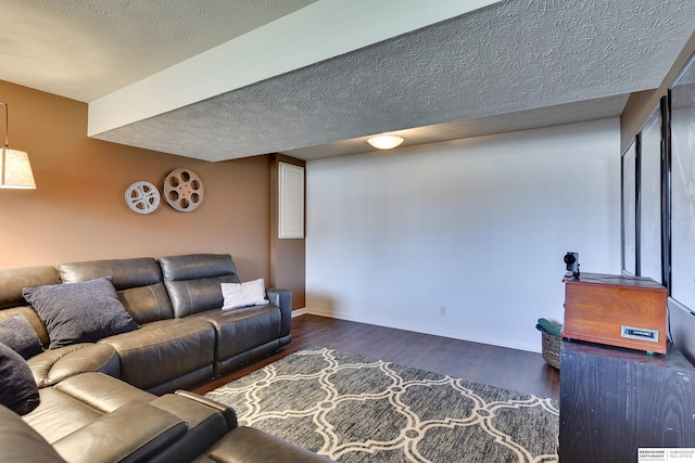 6704 N 149th Ave, Omaha, NE 68116 - living area with wood finished floors, a textured ceiling, and baseboards
