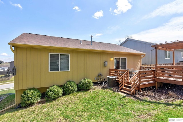 6704 N 149th Ave, Omaha, NE 68116 - rear view of property with a deck, a pergola, a lawn, and roof with shingles