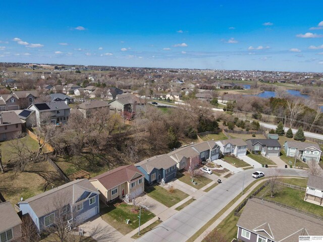 6704 N 149th Ave, Omaha, NE 68116 - aerial view of property and surrounding area featuring nearby suburban area and a nearby body of water