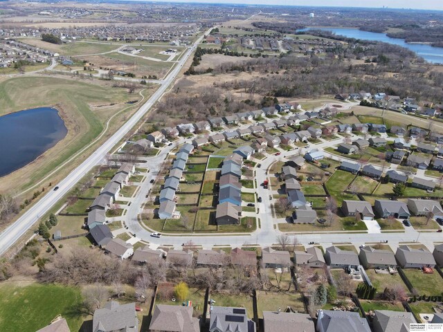 6704 N 149th Ave, Omaha, NE 68116 - aerial overview of property's location with a nearby body of water and nearby suburban area