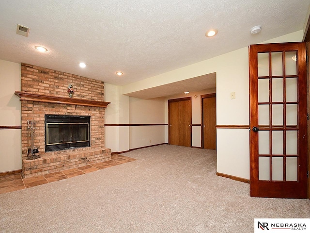 6115 S 115th St, Omaha, NE 68137 - unfurnished living room with carpet, a textured ceiling, recessed lighting, baseboards, and a brick fireplace