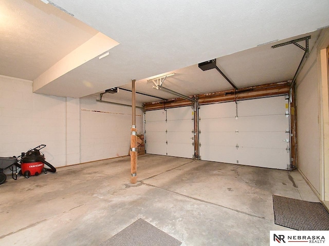 6115 S 115th St, Omaha, NE 68137 - garage with a garage door opener