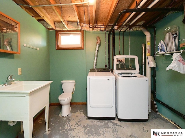 6115 S 115th St, Omaha, NE 68137 - washroom featuring washer and dryer and baseboards