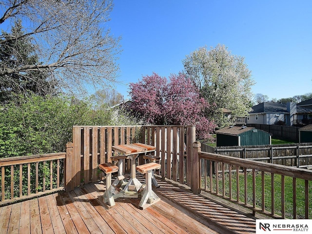 6115 S 115th St, Omaha, NE 68137 - wooden terrace featuring a fenced backyard