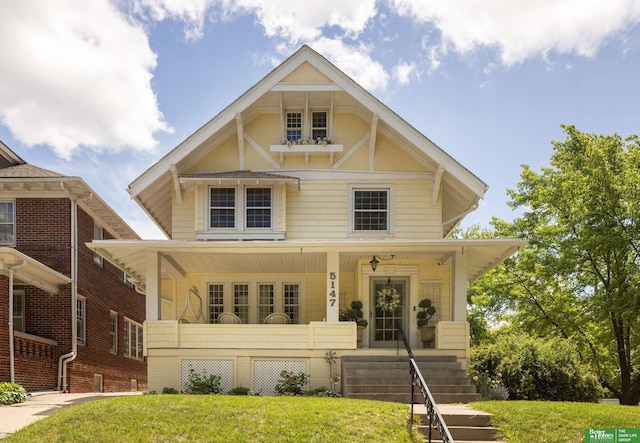 5147 Davenport St, Omaha, NE 68132 - view of front of home featuring covered porch
