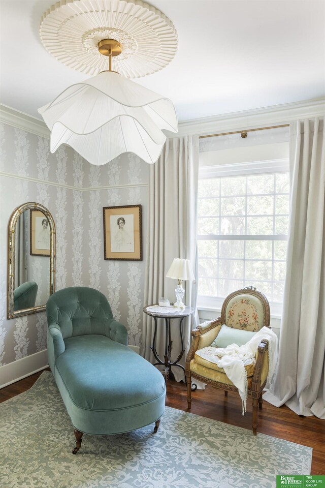 5147 Davenport St, Omaha, NE 68132 - living area with wood finished floors, ornamental molding, and wallpapered walls
