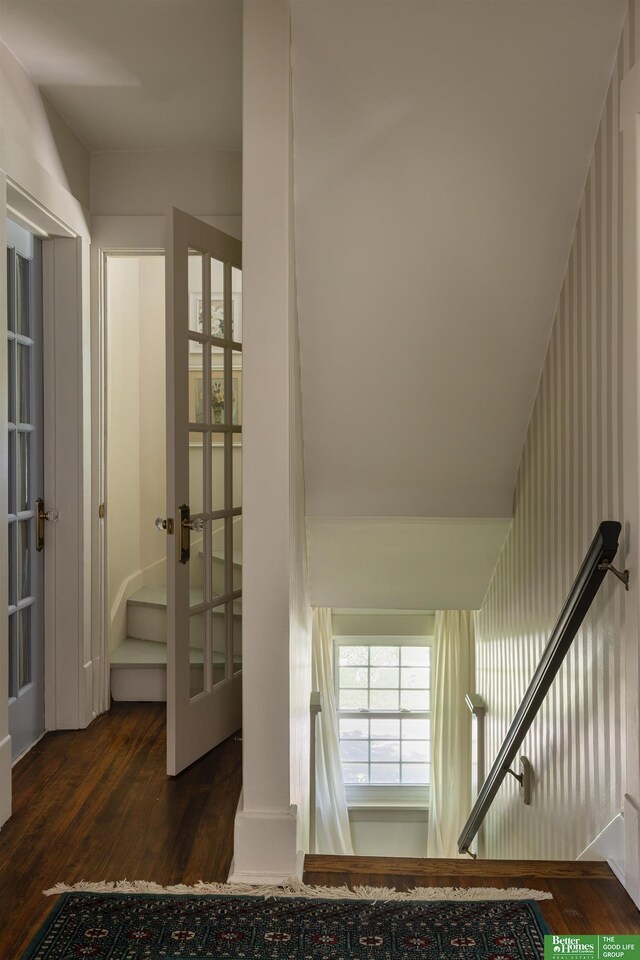 5147 Davenport St, Omaha, NE 68132 - stairs with wood finished floors and french doors