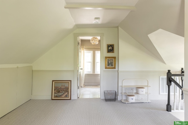 5147 Davenport St, Omaha, NE 68132 - additional living space featuring carpet and vaulted ceiling