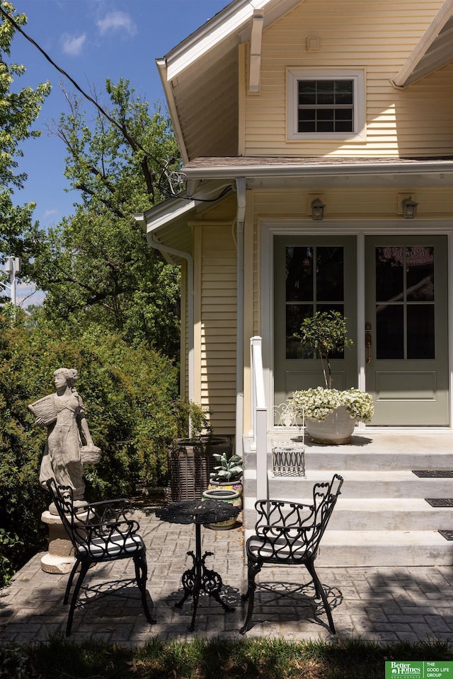 5147 Davenport St, Omaha, NE 68132 - covered porch featuring a patio