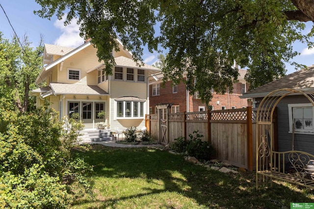 5147 Davenport St, Omaha, NE 68132 - back of house with a shingled roof