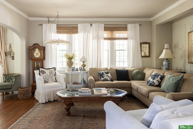 5147 Davenport St, Omaha, NE 68132 - living room featuring arched walkways, wood finished floors, and ornamental molding