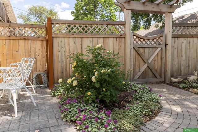 5147 Davenport St, Omaha, NE 68132 - view of patio / terrace with a gate and a pergola