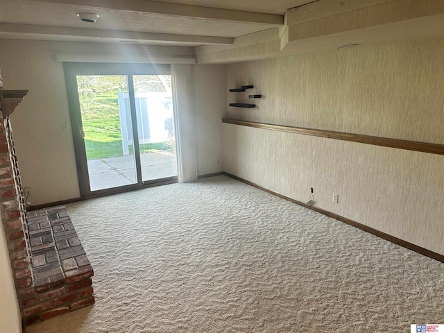 5418 Thies Cove Dr, Lincoln, NE 68516 - unfurnished room with carpet floors, baseboards, and beamed ceiling