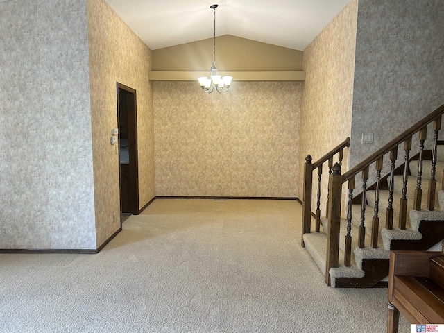 5418 Thies Cove Dr, Lincoln, NE 68516 - hall featuring a chandelier, light colored carpet, lofted ceiling, and stairs