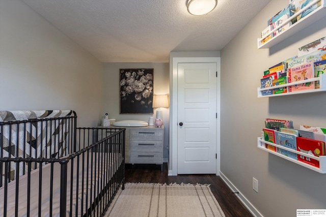 605 2nd St, Waterloo, NE 68069 - hall with dark wood-type flooring and baseboards