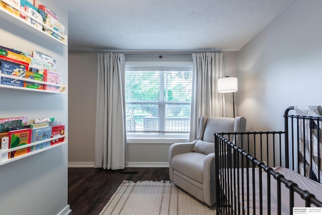 605 2nd St, Waterloo, NE 68069 - living area featuring wood finished floors and baseboards