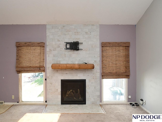 12067 Patrick Ave, Omaha, NE 68164 - detailed view of carpet floors, a fireplace, and baseboards