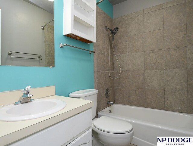 12067 Patrick Ave, Omaha, NE 68164 - bathroom with toilet, vanity, and bathing tub / shower combination
